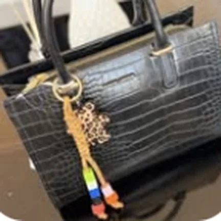 David Jones handbag, black croc-effect with charm
