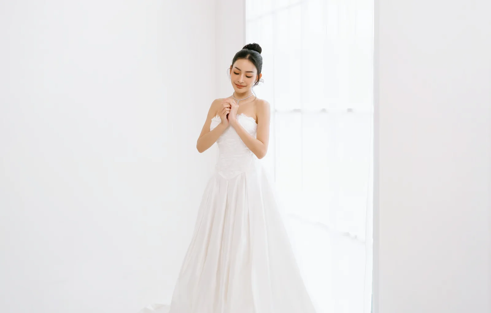 Sleek Top Knot hair.avif