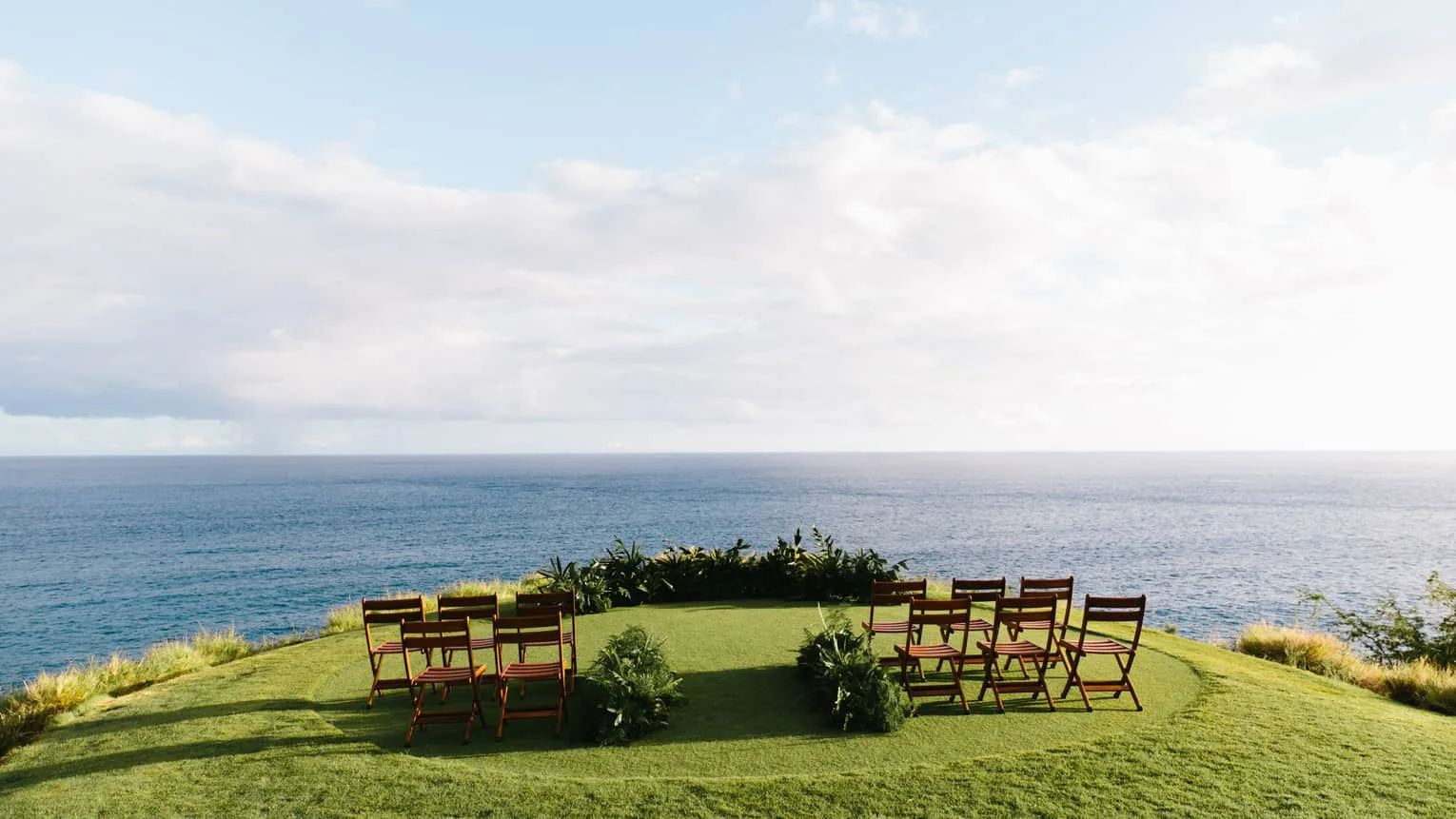 Ceremony chairs on an oceanfront lawn at Four Seasons Resort Lanai, Hawaii | Wedded Wonderland